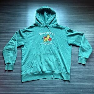 Green cotton hoodie with a unique design